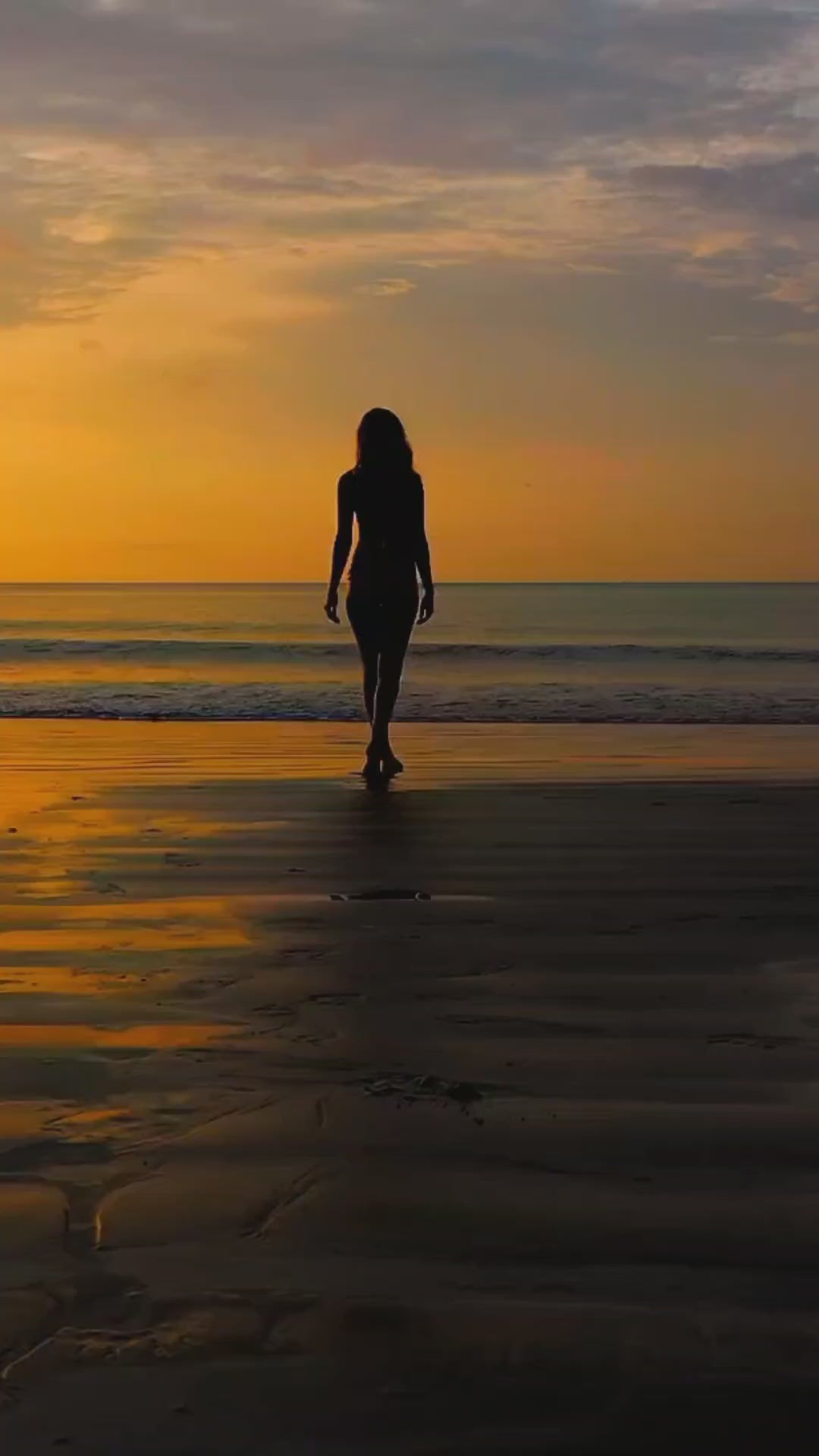 Model walking on the breach with ademora anklet